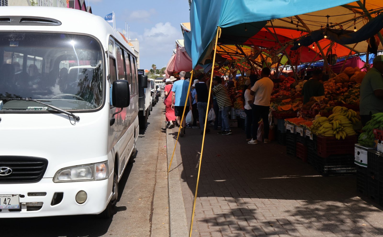 Dushi Experiences bus at the local market
